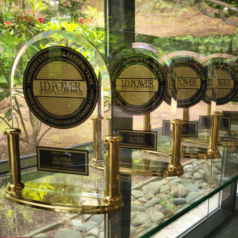 Numerous JD Power trophies awarded to Alaska Airlines.